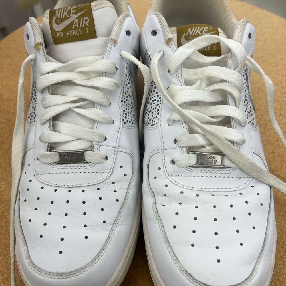 Nike Air Force 1 White and Gold Sneakers